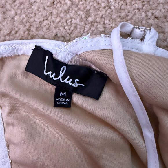 Lulu’s small crisscross sparkly dress - Picture 2 of 2